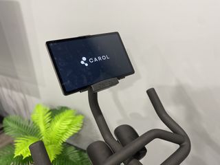 The device holder on the CAROL Bike with a tablet in place