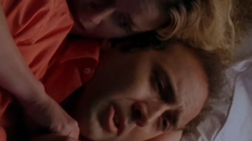 Elizabeth Shue holding Nicolas Cage in Leaving Las Vegas