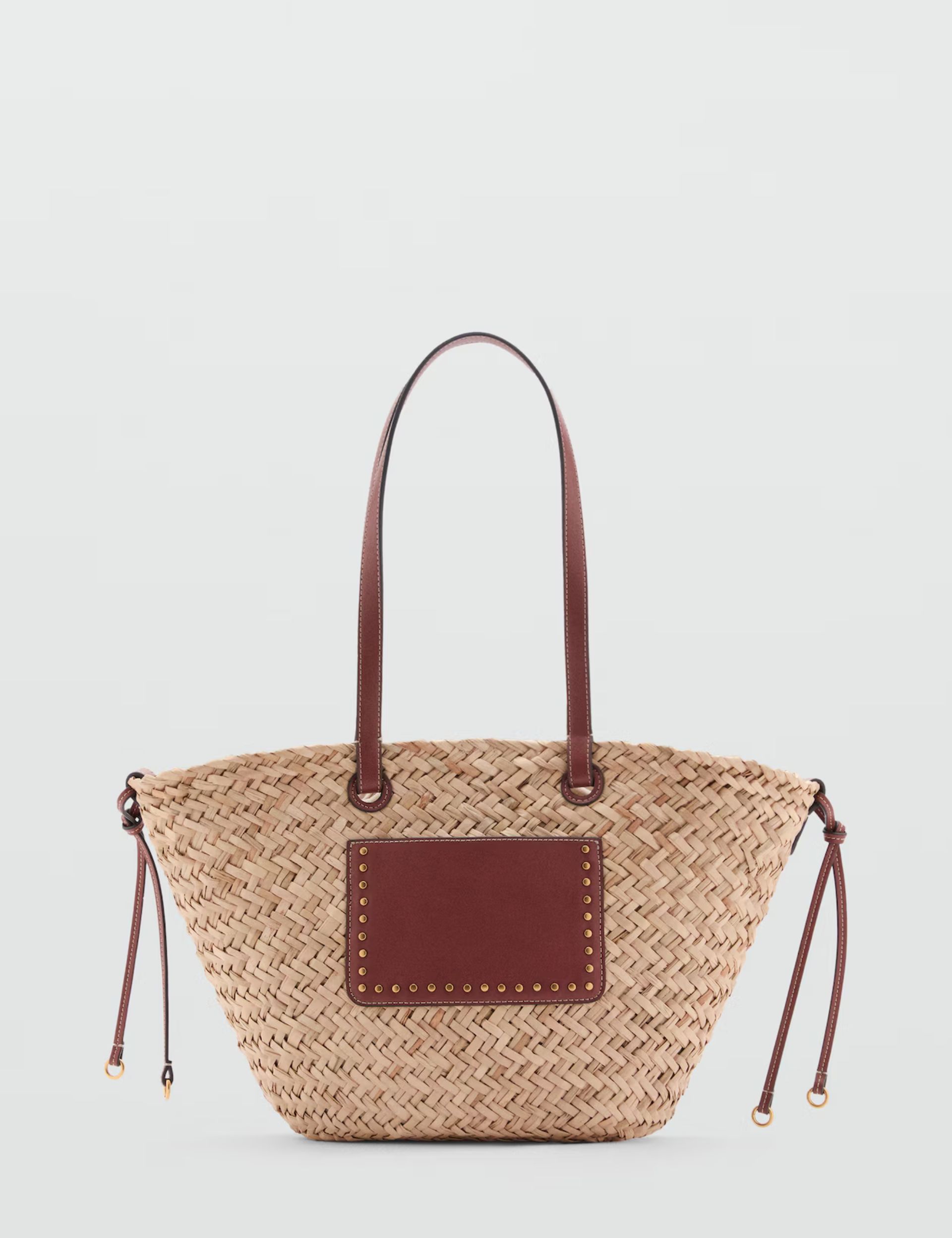 Large double-handle natural fibre basket cut out 