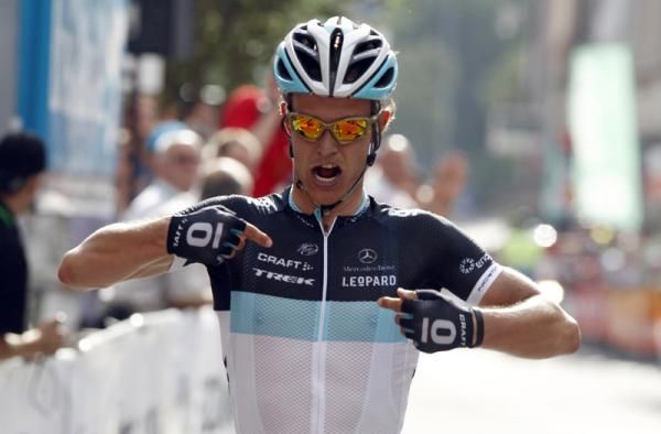 Gerdemann (Leopard Trek) points to his sponsors