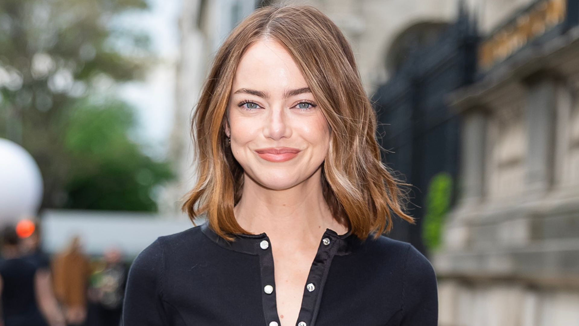 Emma Stone attended the Louis Vuitton Cruise 2027 show in a cozy cardigan set