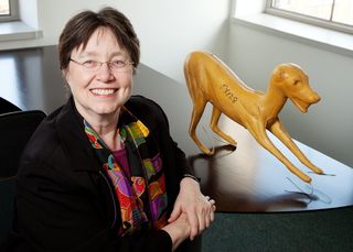 Anthropologist Jane Desmond with an animal mold used in taxidermy.