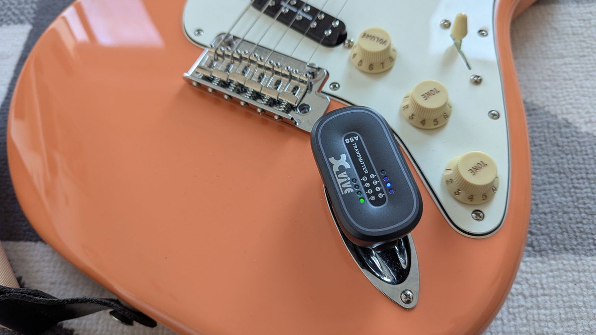 Closeup of Xvive A58 wireless system in a Fender Stratocaster jack