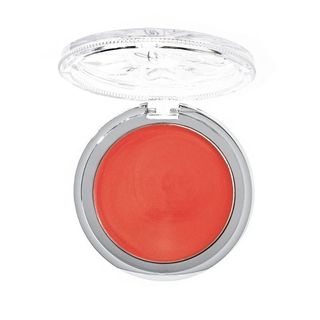 An opened orange highlighting face and body balm for Black-owned beauty and skincare brands.