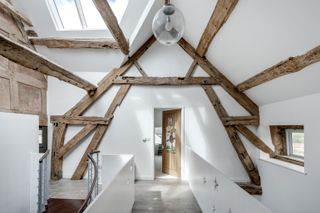 Incredible landing idea for oak frame house