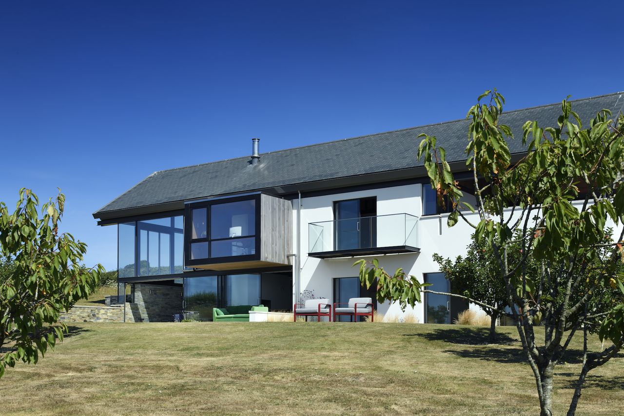 exterior of self build with inside outside space