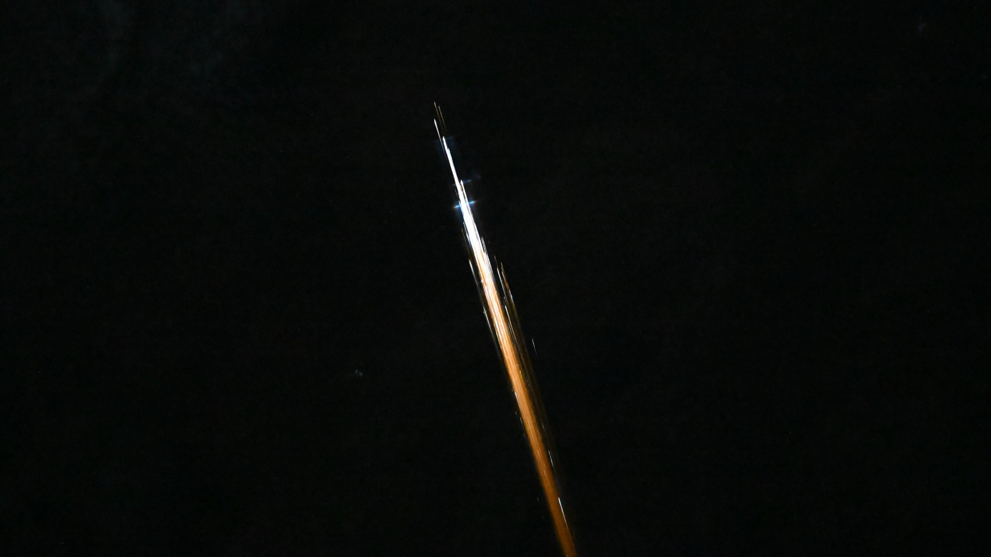 NASA astronaut Chris Williams photographed this fireball &mdash; likely caused by reentering orbital debris &mdash; from the International Space Station on April 27, 2026.