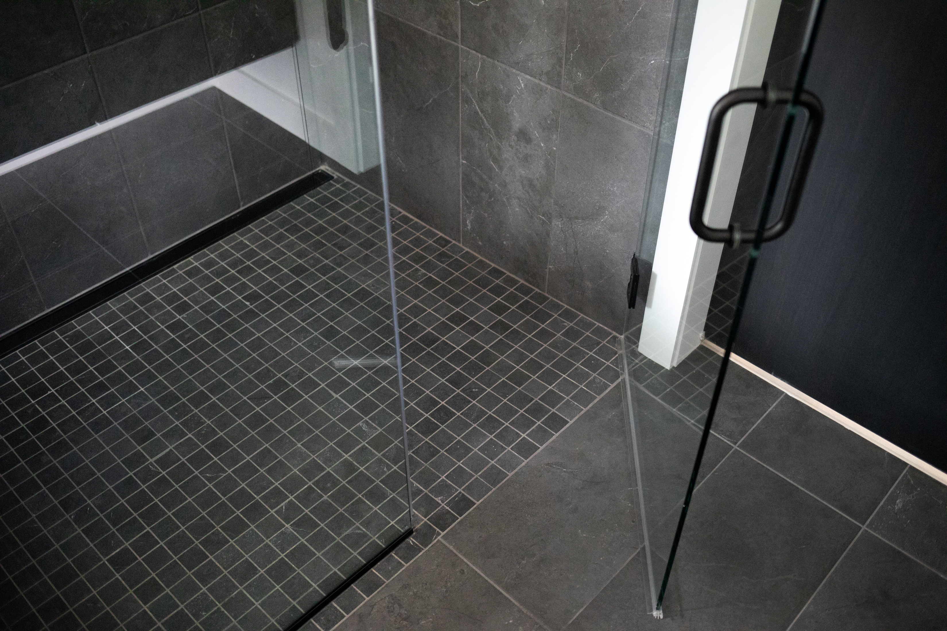Dark gray bathroom tiles