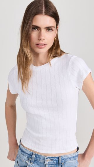 a model wears a white T-shirt