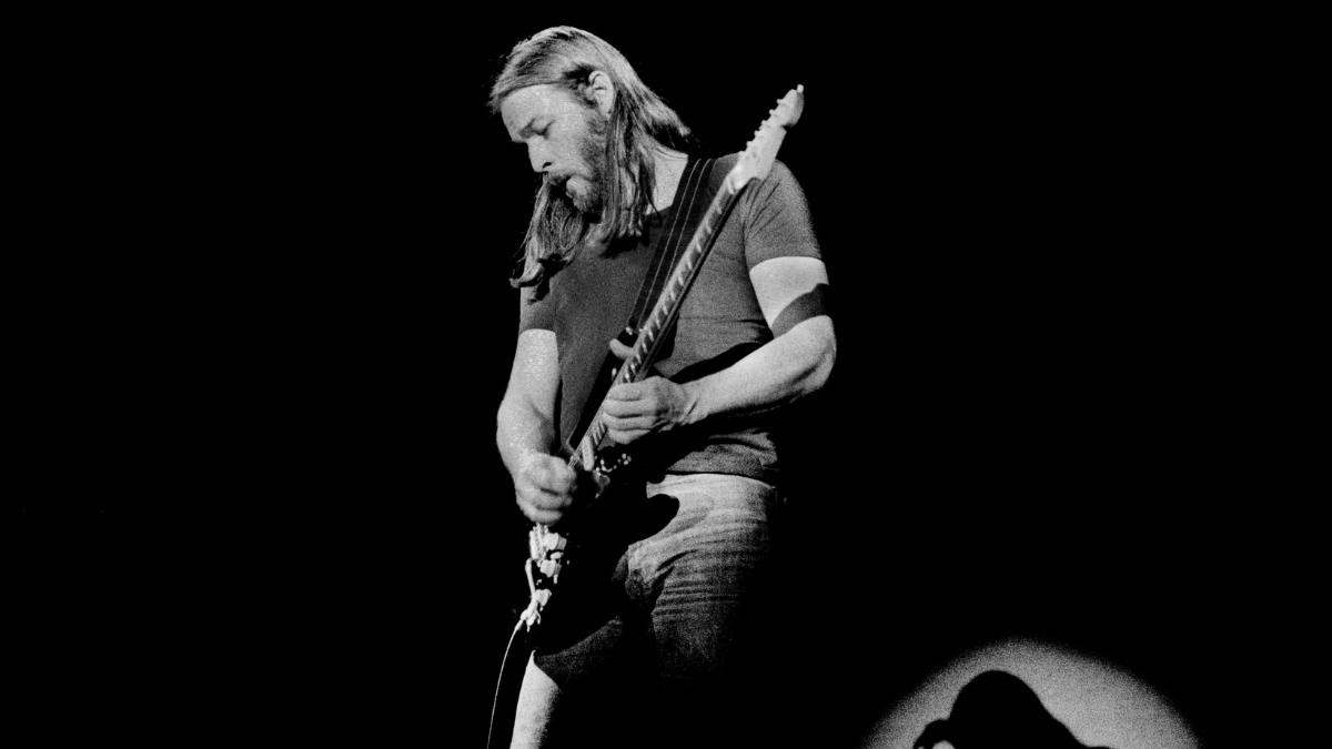 David Gilmour from Pink Floyd performs live on stage at Ahoy in Rotterdam, Holland in February 1977 during the Animals tour (Photo by Gijsbert Hanekroot/Redferns)