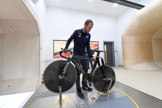 Chris Hebert, British Cycling, sets up a Lotus bike inside a wind tunnel