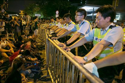 Beijing warns of 'chaos' if Hong Kong protests continue
