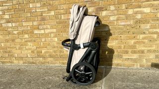 a photo of the folded Bugaboo Fox 5 with the bassinet