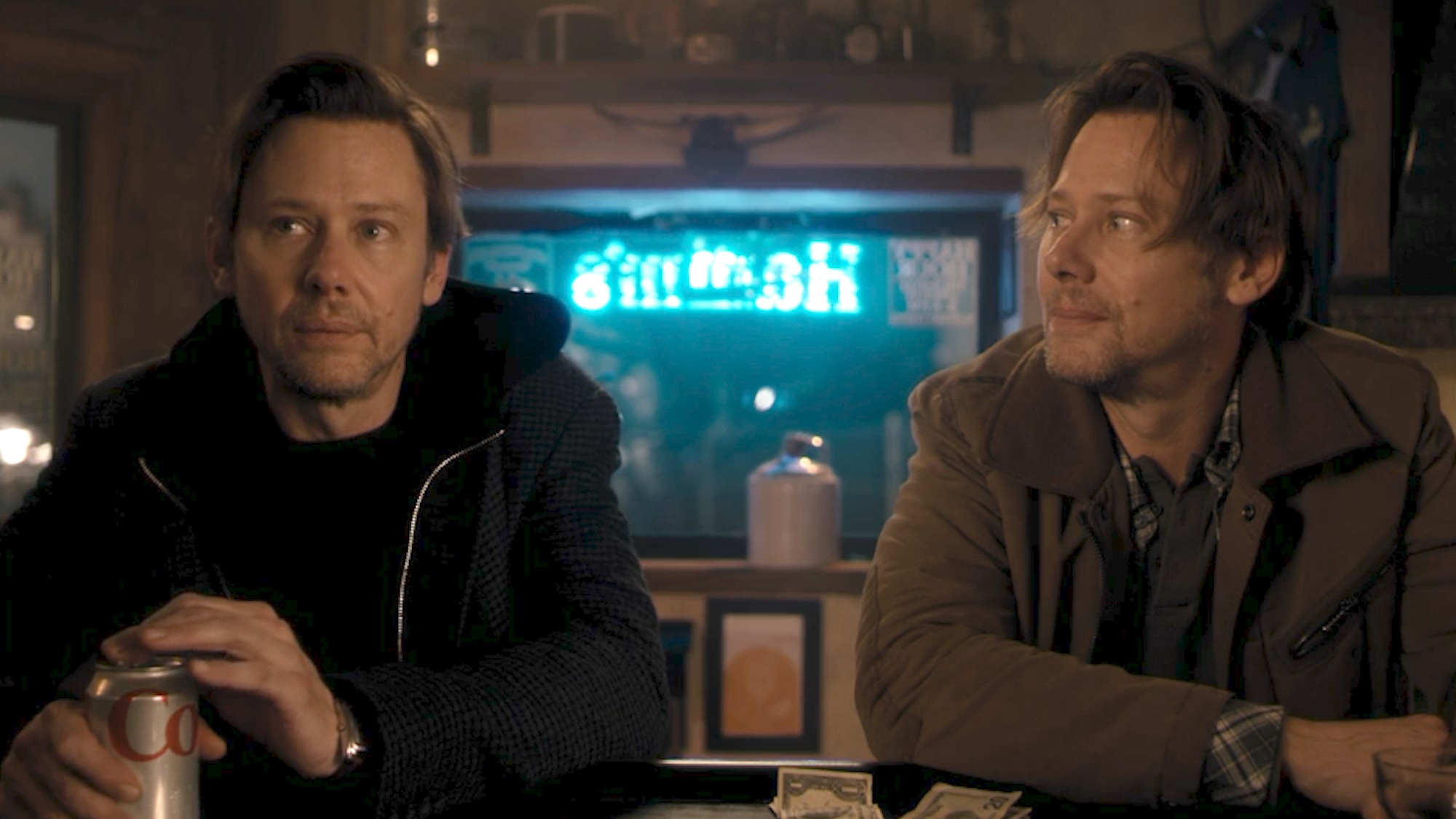Jimmi Simpson sitting next to Jimmi Simpson in Dark Matter