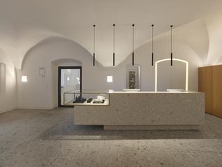 reception space and geometric desk inside Boksto 6 by Christina Seilern