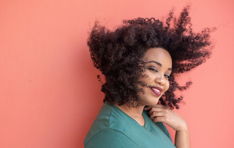 woman with curly hair, best brushes for curly hair