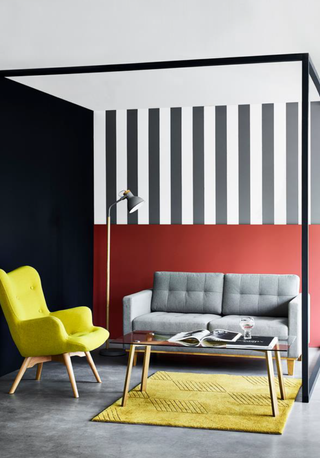 eclectic living room with stripe wallpaper