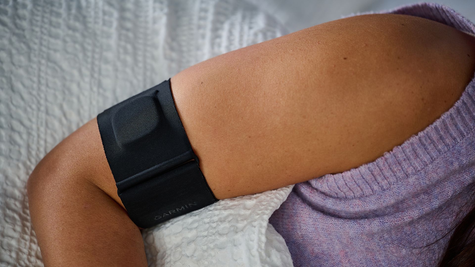 Our sleep tech tester testing the Garmin Index Sleep Monitor