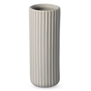 A white fluted vase