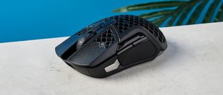 Photograph of the SteelSeries Aerox 5 wireless gaming mouse with honeycomb design