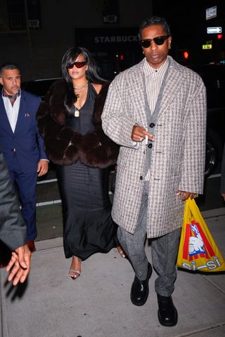 A photo of Rihanna accompanying A$AP Rocky and his fresh-off-the-runway yellow plastic shopping bag to the rapper's 36th birthday celebration.