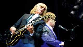 Davey Johnstone (left) and Elton John perform at the Ondrej Nepela Arena in Bratislava, Slovakia on July 10, 2012