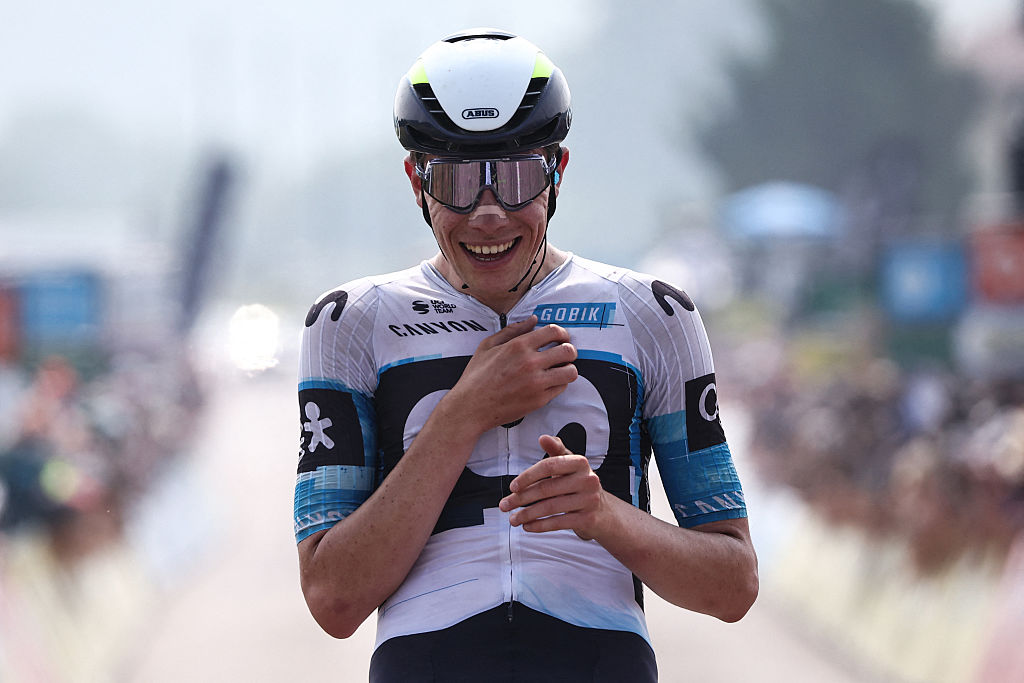 Movistar Team&#039;s Spanish rider Ivan Romeo Abad celebrates as he crosses the finish line to win the 3rd stage of the 77th edition of the Criterium du Dauphine cycling race, 207,2 km between Brioude and Charantonnay, on June 10, 2025. (Photo by Anne-Christine POUJOULAT / AFP) (Photo by ANNE-CHRISTINE POUJOULAT/AFP via Getty Images)