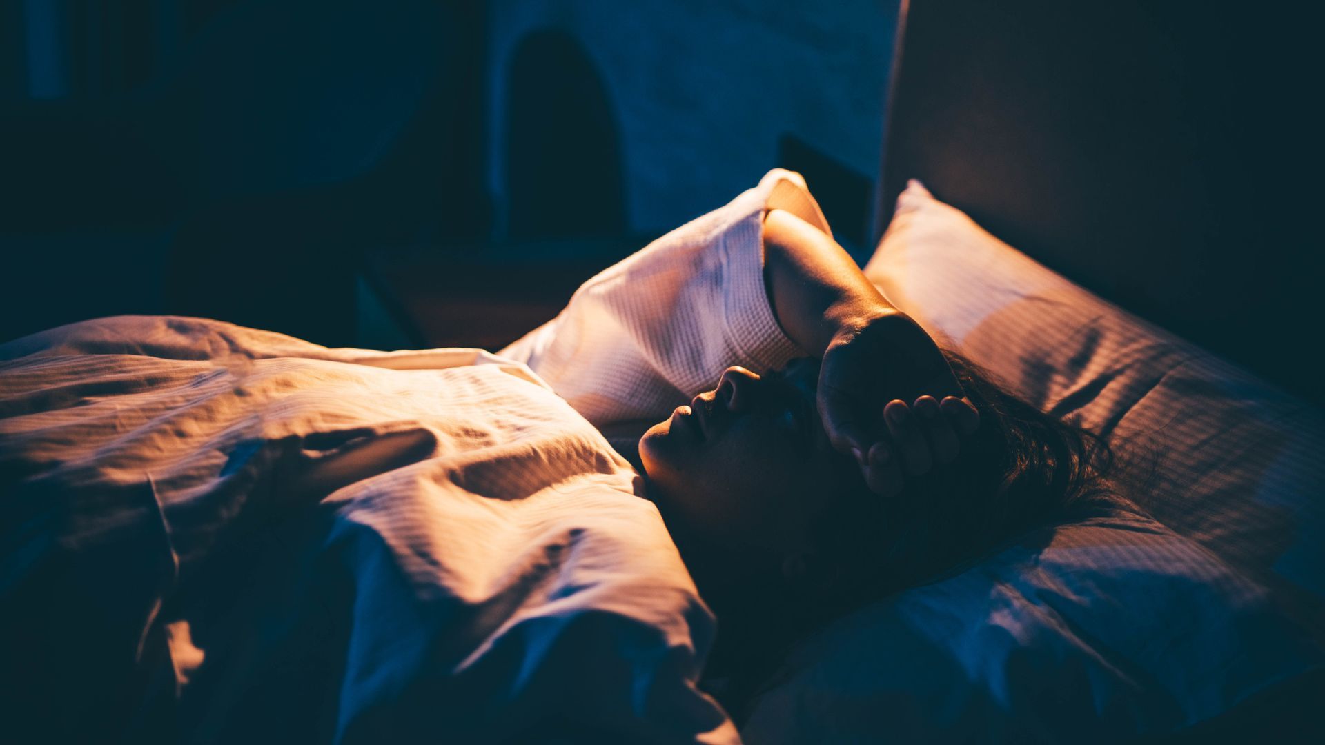 How to calm anxiety at night naturally, according to a sleep doctor ...