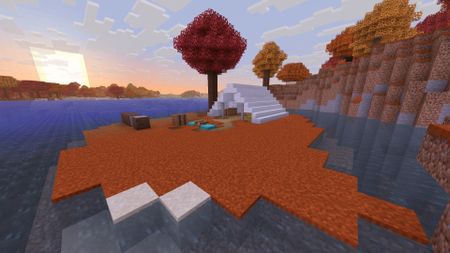 The sun goes down behind an abandoned camp on an island in one of the best Minecraft seeds for 26.3