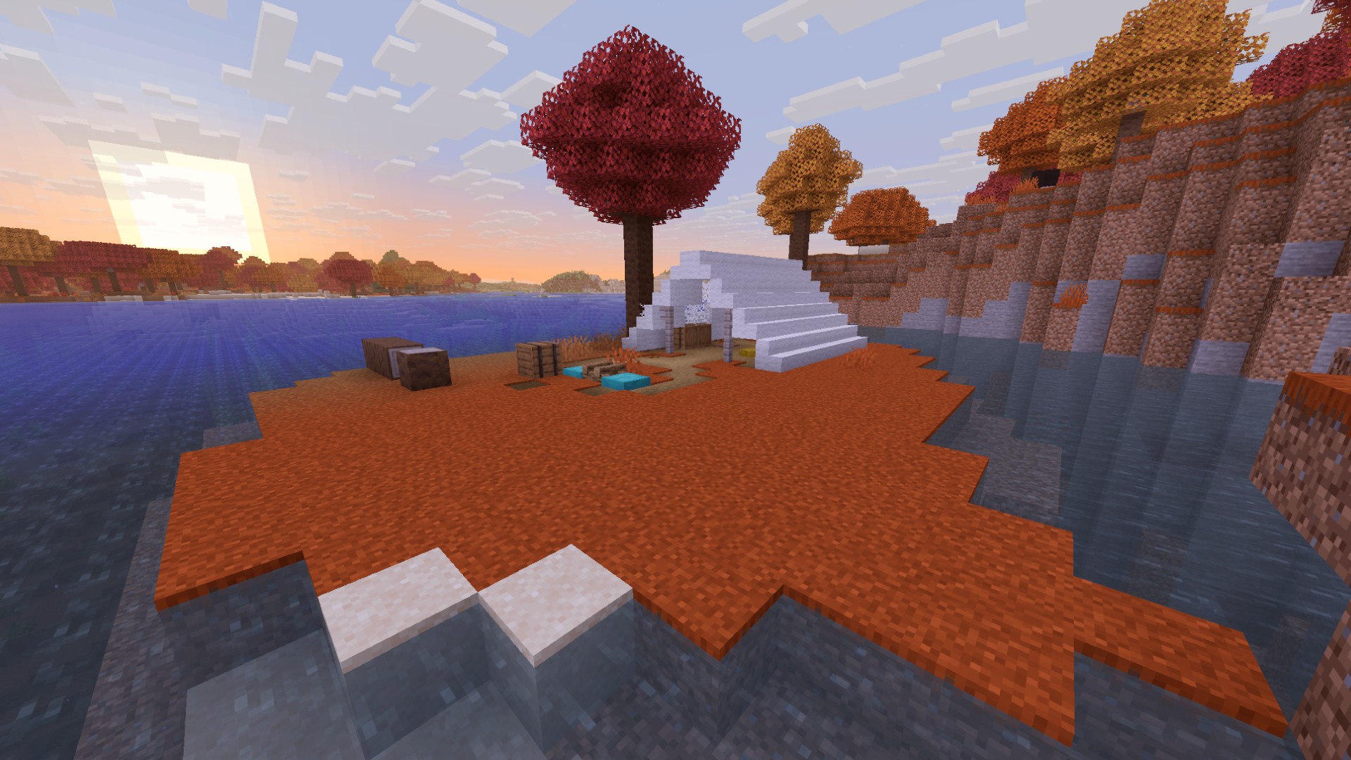 The sun goes down behind an abandoned camp on an island in one of the best Minecraft seeds for 26.3