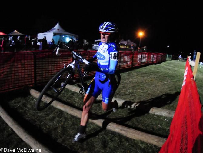 Katerina Nash (Luna Pro Team) running barriers with one lap to go
