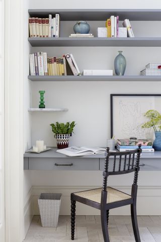 living room with office alcove and shelving