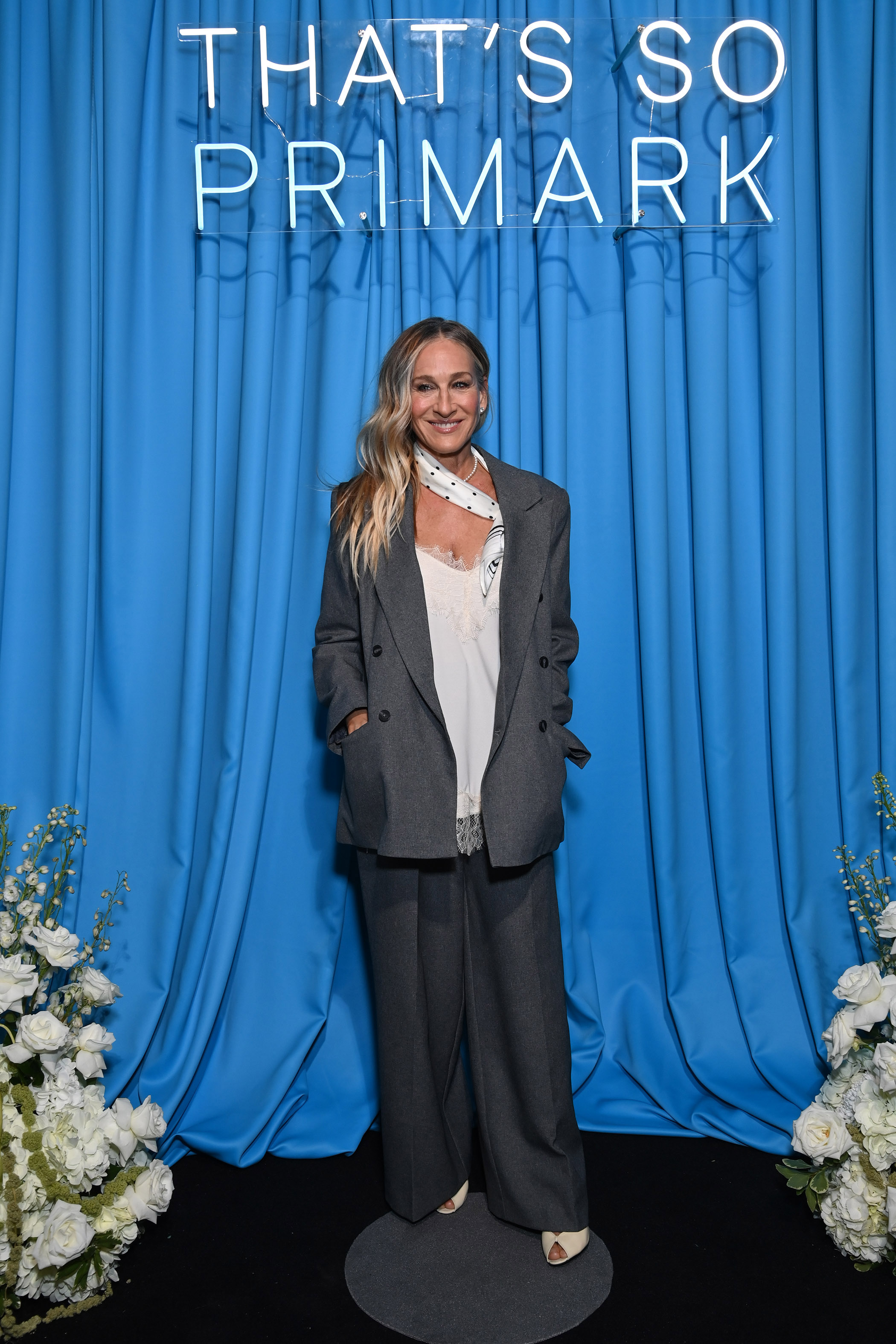 Sarah Jessica Parker in a grey suit