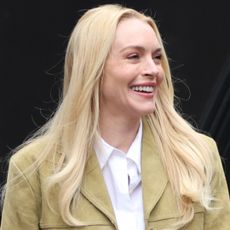 Lindsay Lohan filmed a new project in straight-leg jeans and white leather loafers