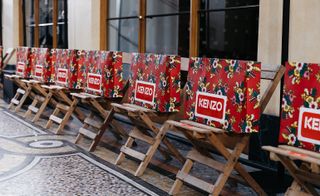 Kenzo gift bags on wooden chairs