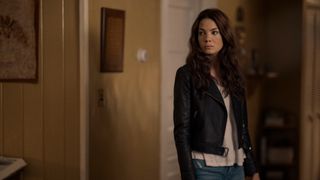 Michelle Monaghan wearing a leather jacket and jeans as Gina McCleary in Echoes