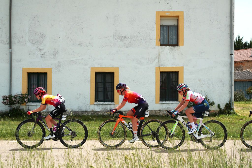 AGUILAR DE CAMPOO SPAIN MAY 20 LR Niamh FisherBlack of New Zealand and Team SD Worx Marit Raaijmakers of Netherlands and Team Human Powered Health and Alena Amialiusik of Belarus and Team CanyonSRAM Racing compete during the 7th Vuelta a Burgos Feminas 2022 Stage 2 a 128km stage from Sasamn to Aguilar de Campoo VueltaBurgos BurgosFem UCIWWT on May 20 2022 in Aguilar de Campoo Spain Photo by Gonzalo Arroyo MorenoGetty Images