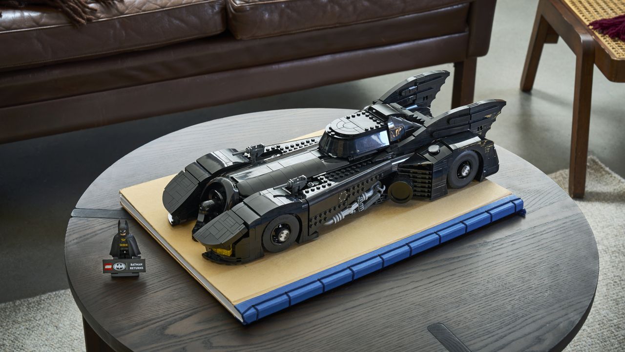 Lego Batman Returns Batmobile and minifigure on a small table