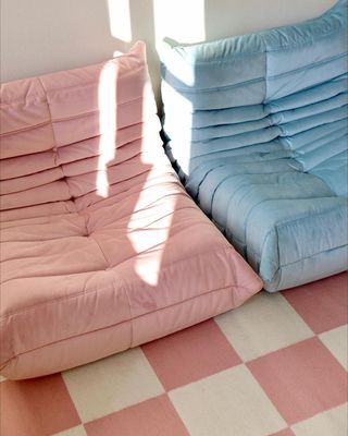 Pastel chairs on a checkerboard rug