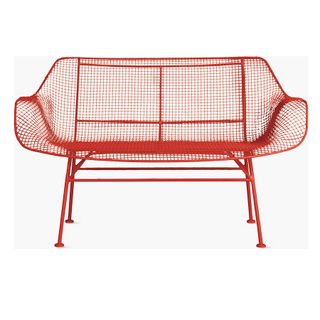 A sculptural red bench