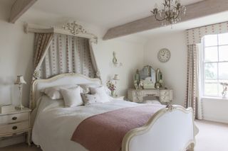 Elegant French-style bed in 18th century home