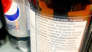 close up on the nutrition label on a bottle of diet pepsi, which includes 