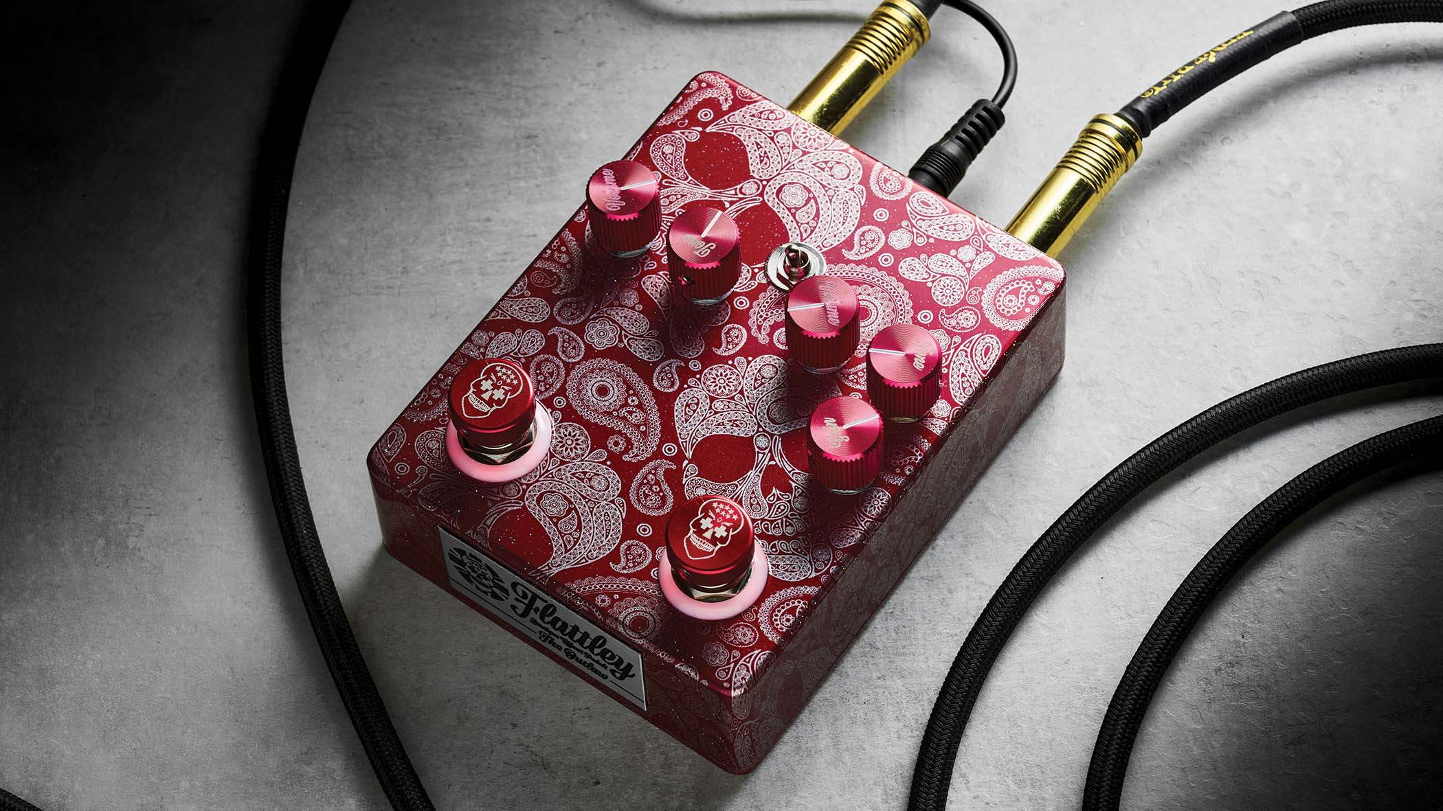 Flattley The Outlaw &ndash; the red-pink boost/drive twofer is decorated in Mexican Day of the Dead inspired graphics