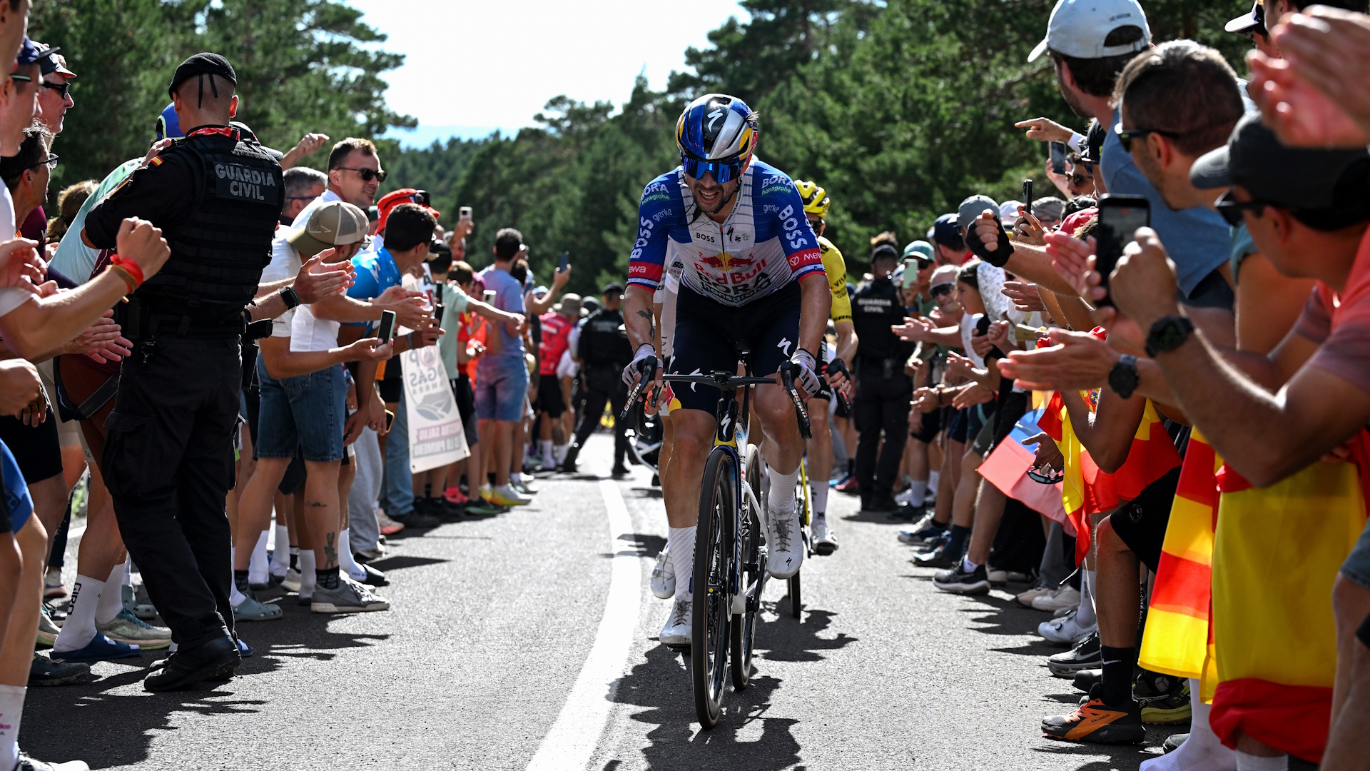Primoz Roglic of Slovenia and Team Red Bull competes climbing to the Aramon Valdelinares (1,965m) while fans cheer during the La Vuelta a Espana 2026.