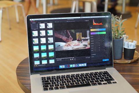 A laptop using VideoProc Vlogger video-editing software