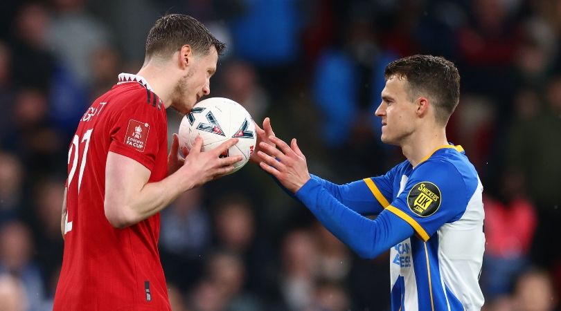 Manchester United&#039;s Wout Weghorst kisses the ball before handing it to Brighton&#039;s Solly March before the latter&#039;s penalty miss in the shootout in the teams&#039; FA Cup semi-final at Wembley in April 2023.