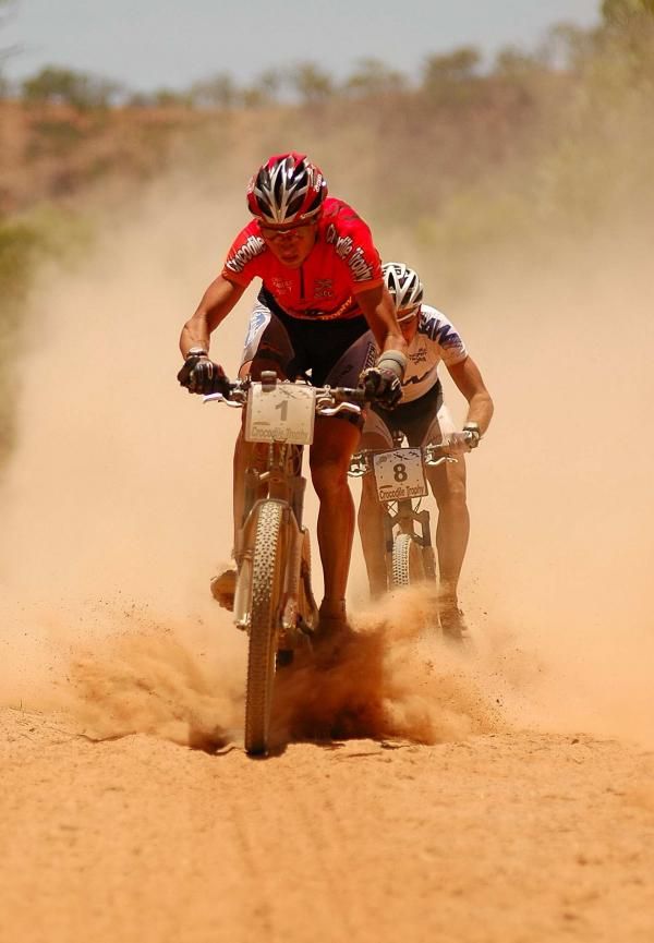 Bart Brentjens kicks up dust for Urs Huber.