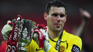 LONDON - MARCH 01: Goalkeeper Ben Foster of Manchester United celebrates with the trophy after victory during the Carling Cup Final match between Manchester United and Tottenham Hotspur at Wembley Stadium on March 1, 2009 in London, England. (Photo by Mike Hewitt/Getty Images)