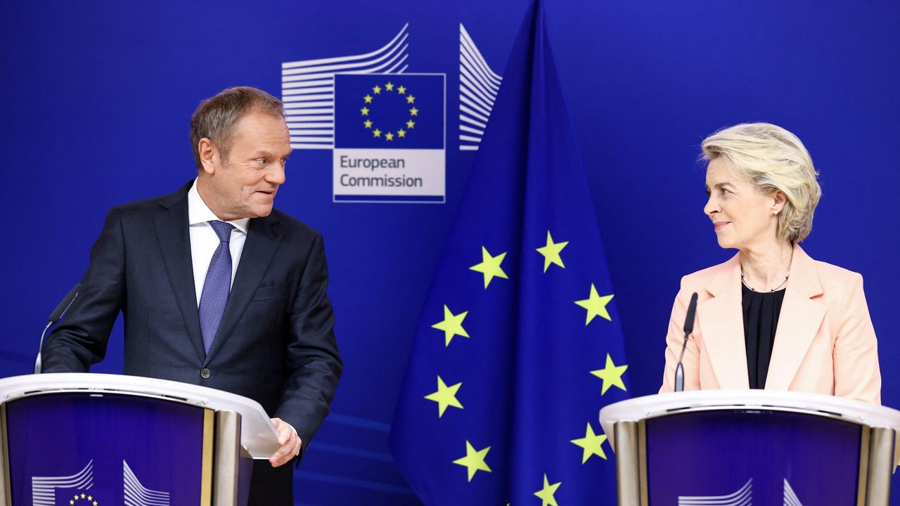 European Commission president Ursula von der Leyen and Polish opposition leader Donald Tusk give a press conference at the EU headquarters in Brussels