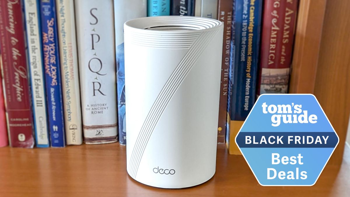 A TP-Link Deco BE63 mesh router with a Tom&#039;s Guide Black Friday Best Deals badge next to it